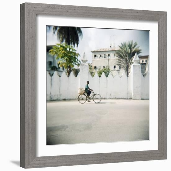 Man on Bicycle with Old Buildings Behind, Stone Town, Zanzibar, Tanzania, East Africa, Africa-Lee Frost-Framed Photographic Print