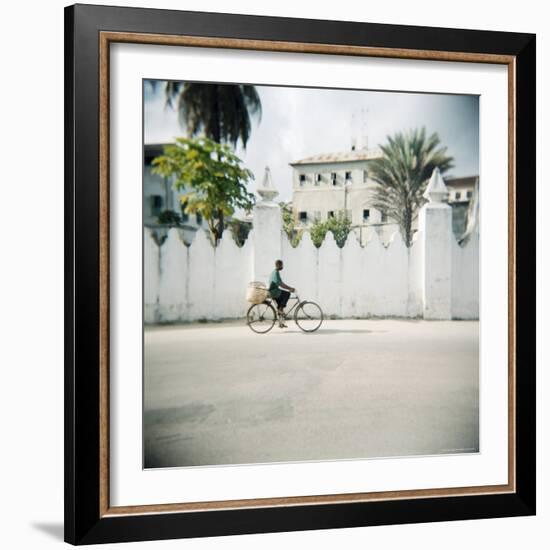 Man on Bicycle with Old Buildings Behind, Stone Town, Zanzibar, Tanzania, East Africa, Africa-Lee Frost-Framed Photographic Print