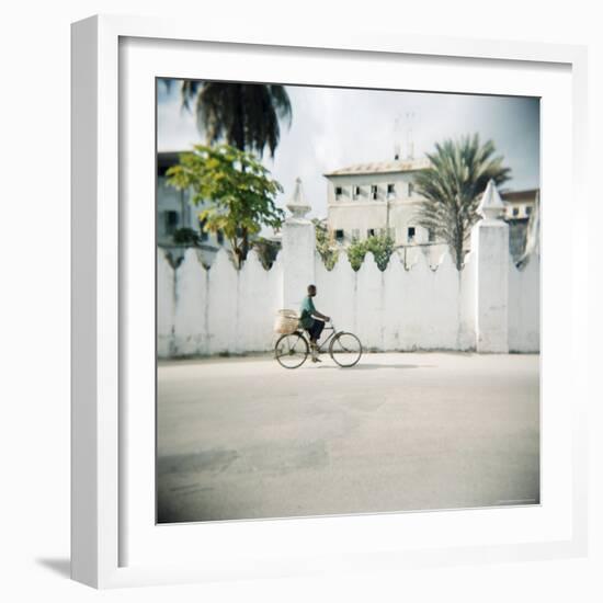 Man on Bicycle with Old Buildings Behind, Stone Town, Zanzibar, Tanzania, East Africa, Africa-Lee Frost-Framed Photographic Print