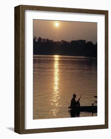 Man on Boat on River Near Dr. Albert Schweitzer's Compound at Lambarene-George Silk-Framed Photographic Print