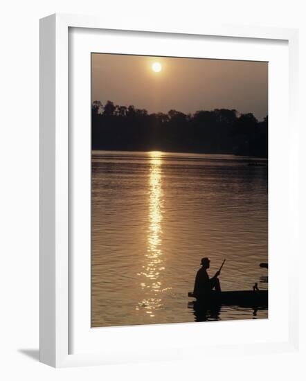 Man on Boat on River Near Dr. Albert Schweitzer's Compound at Lambarene-George Silk-Framed Photographic Print