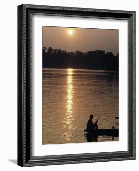 Man on Boat on River Near Dr. Albert Schweitzer's Compound at Lambarene-George Silk-Framed Photographic Print