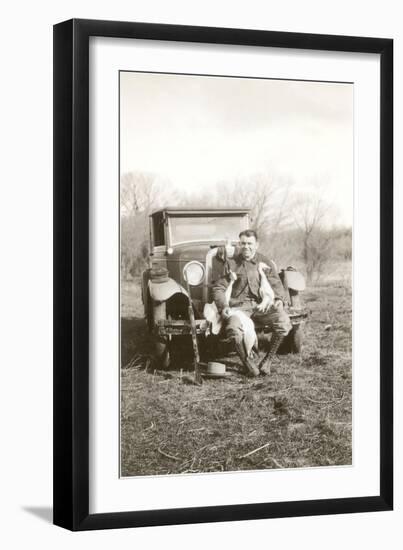 Man on Bumper of Vintage Car with Dead Ducks-null-Framed Art Print