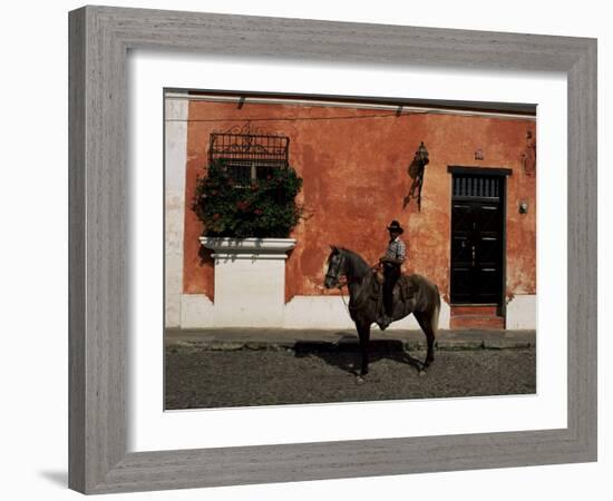 Man on Horse in Front of a Typical Painted Wall, Antigua, Guatemala, Central America-Upperhall-Framed Photographic Print