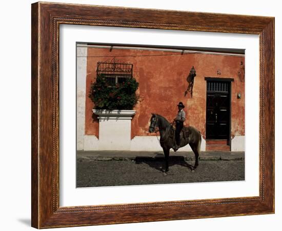 Man on Horse in Front of a Typical Painted Wall, Antigua, Guatemala, Central America-Upperhall-Framed Photographic Print