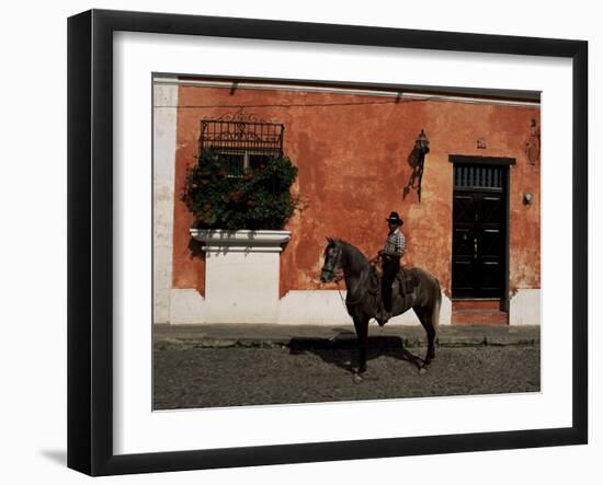 Man on Horse in Front of a Typical Painted Wall, Antigua, Guatemala, Central America-Upperhall-Framed Photographic Print