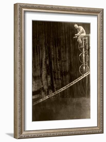 Man on Trick Triple Unicycle-null-Framed Art Print