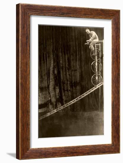 Man on Trick Triple Unicycle-null-Framed Art Print