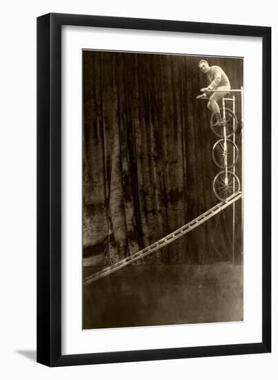 Man on Trick Triple Unicycle-null-Framed Art Print