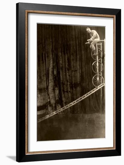 Man on Trick Triple Unicycle-null-Framed Art Print