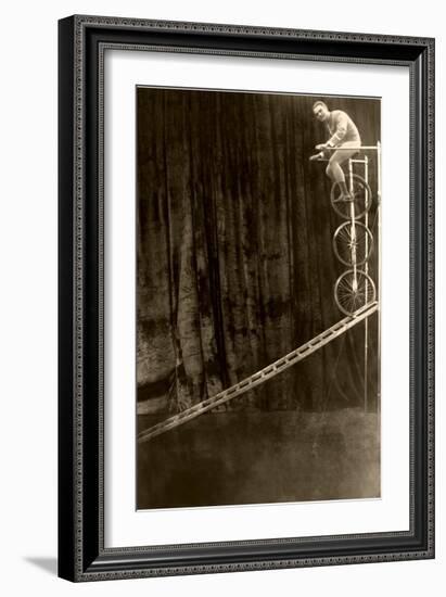 Man on Trick Triple Unicycle-null-Framed Art Print