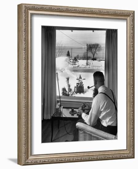 Man Operating Remote Control Snow Plow-Joe Scherschel-Framed Photographic Print