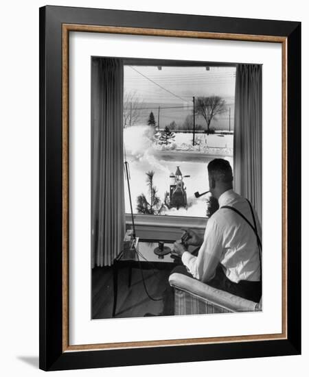 Man Operating Remote Control Snow Plow-Joe Scherschel-Framed Photographic Print