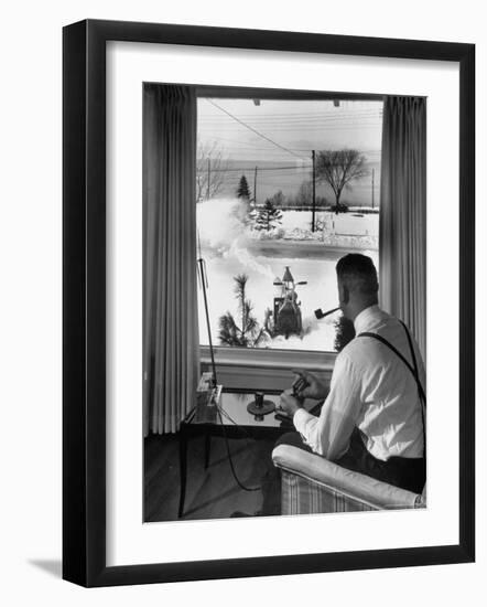 Man Operating Remote Control Snow Plow-Joe Scherschel-Framed Photographic Print