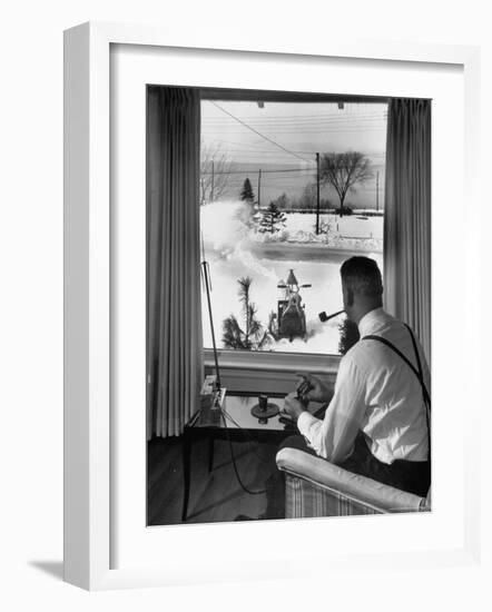 Man Operating Remote Control Snow Plow-Joe Scherschel-Framed Photographic Print