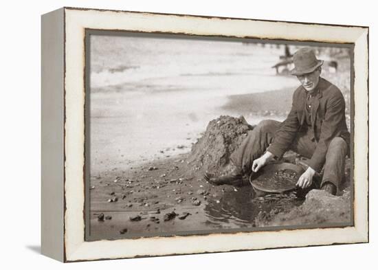 Man Panning Gold on Nome, Alaska, Beach in the Early 20th Century-null-Framed Stretched Canvas
