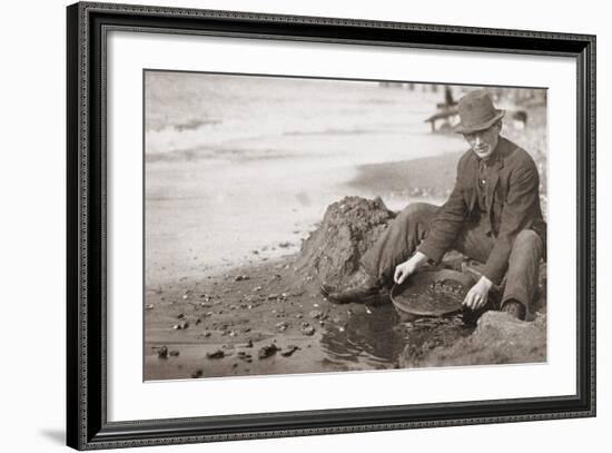 Man Panning Gold on Nome, Alaska, Beach in the Early 20th Century-null-Framed Photo