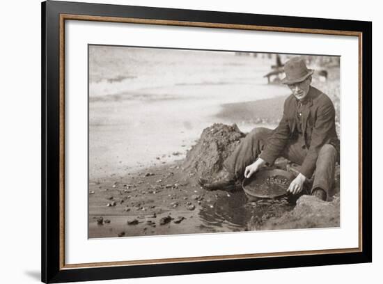 Man Panning Gold on Nome, Alaska, Beach in the Early 20th Century-null-Framed Photo