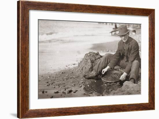 Man Panning Gold on Nome, Alaska, Beach in the Early 20th Century-null-Framed Photo