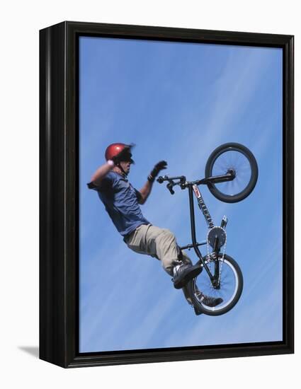 Man Performing Trick on a Bicycle-null-Framed Premier Image Canvas