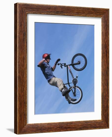 Man Performing Trick on a Bicycle-null-Framed Photographic Print