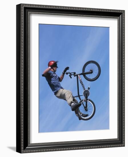 Man Performing Trick on a Bicycle-null-Framed Photographic Print