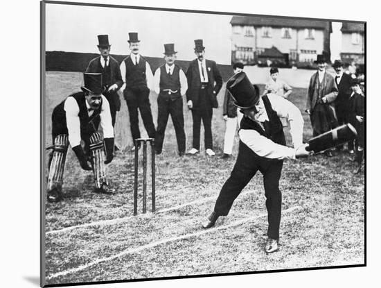 Man Playing Cricket-null-Mounted Photographic Print