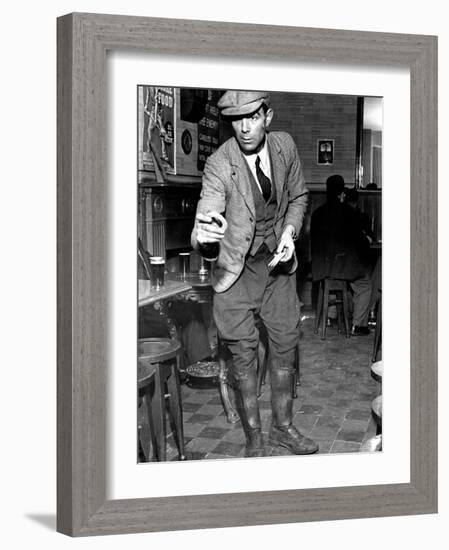 Man Playing Quoits, Like Horse Shoes, in an English Pub-Hans Wild-Framed Photographic Print