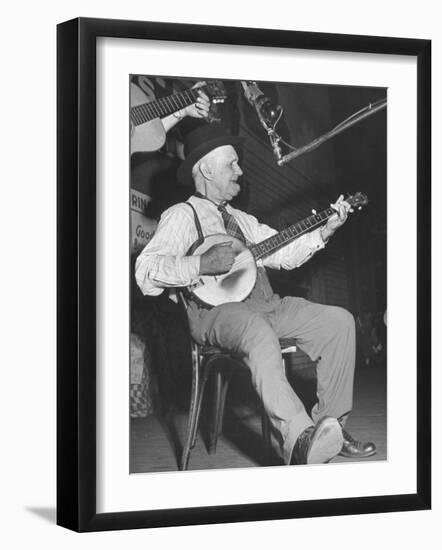 Man Playing the Banjo Onstage at the Grand Ole Opry-Ed Clark-Framed Photographic Print