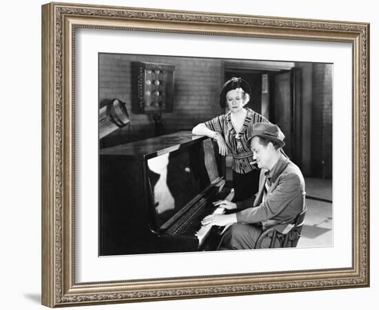 Man Playing the Piano While a Woman is Listening-null-Framed Photo