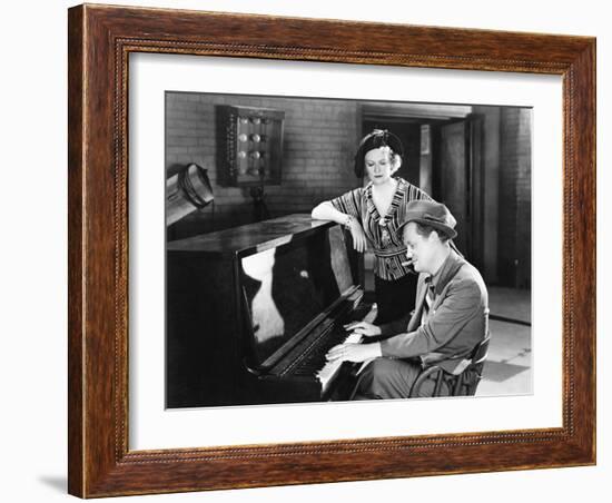 Man Playing the Piano While a Woman is Listening-null-Framed Photo