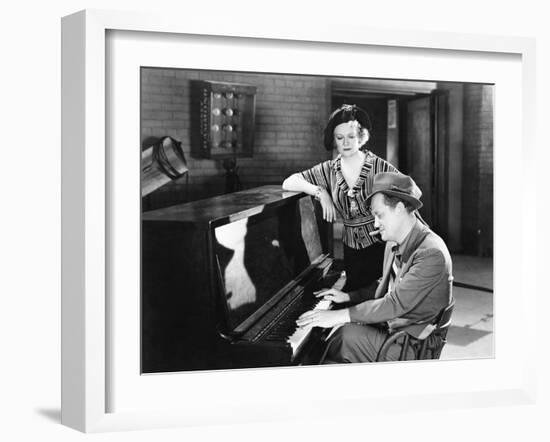 Man Playing the Piano While a Woman is Listening-null-Framed Photo