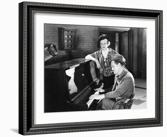 Man Playing the Piano While a Woman is Listening-null-Framed Photo