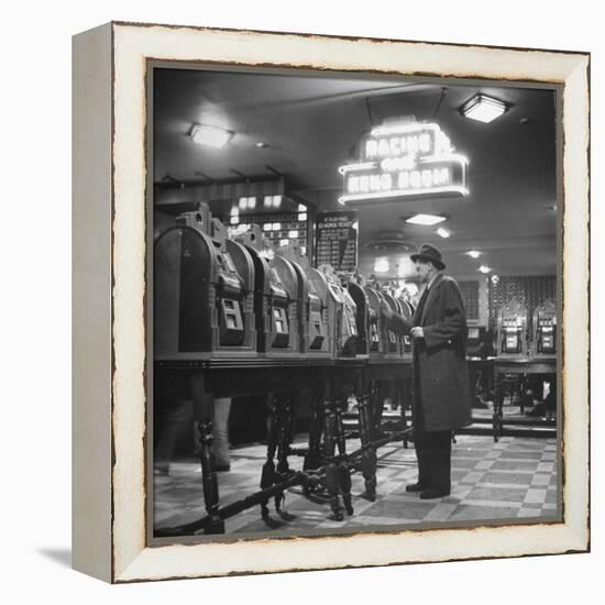 Man Playing the Slot Machines-Ralph Morse-Framed Premier Image Canvas