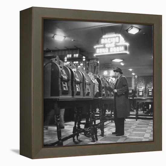 Man Playing the Slot Machines-Ralph Morse-Framed Premier Image Canvas