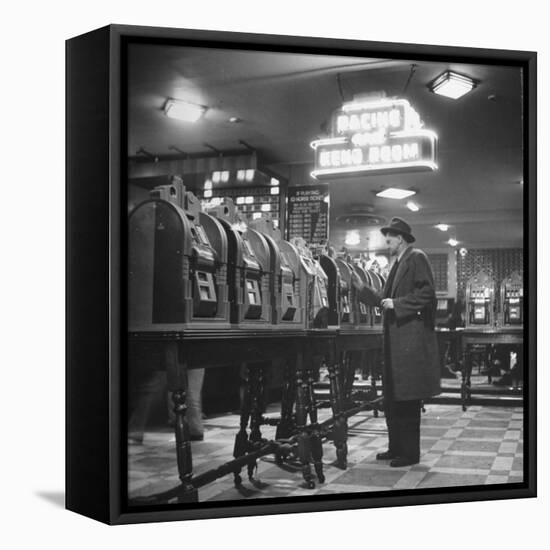 Man Playing the Slot Machines-Ralph Morse-Framed Premier Image Canvas