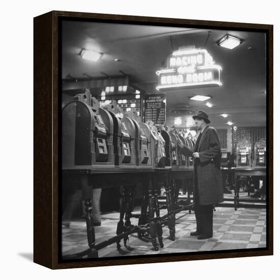 Man Playing the Slot Machines-Ralph Morse-Framed Premier Image Canvas