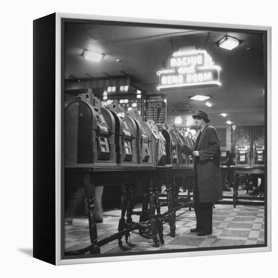 Man Playing the Slot Machines-Ralph Morse-Framed Premier Image Canvas