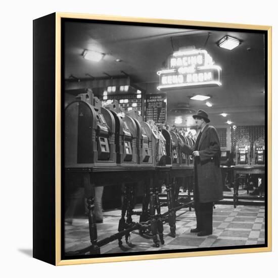 Man Playing the Slot Machines-Ralph Morse-Framed Premier Image Canvas