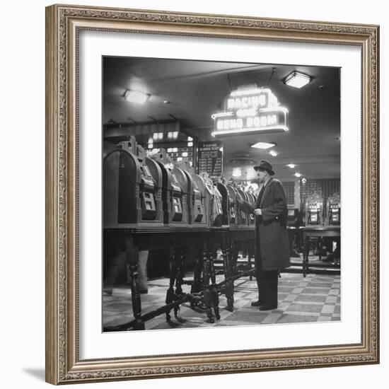 Man Playing the Slot Machines-Ralph Morse-Framed Photographic Print