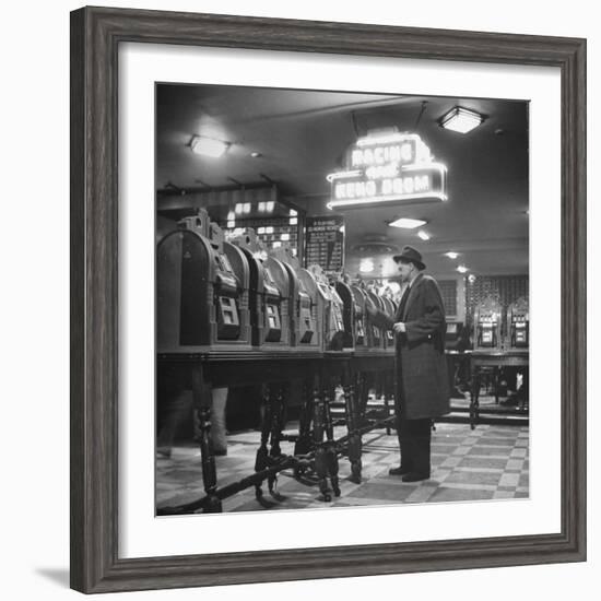 Man Playing the Slot Machines-Ralph Morse-Framed Photographic Print