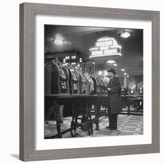 Man Playing the Slot Machines-Ralph Morse-Framed Photographic Print