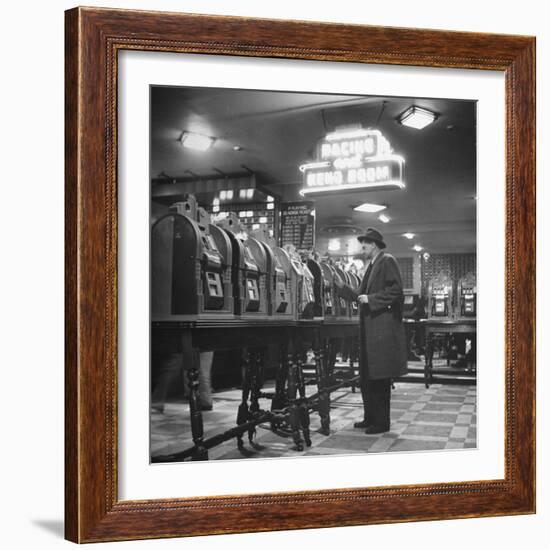 Man Playing the Slot Machines-Ralph Morse-Framed Photographic Print