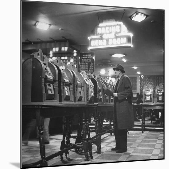 Man Playing the Slot Machines-Ralph Morse-Mounted Photographic Print