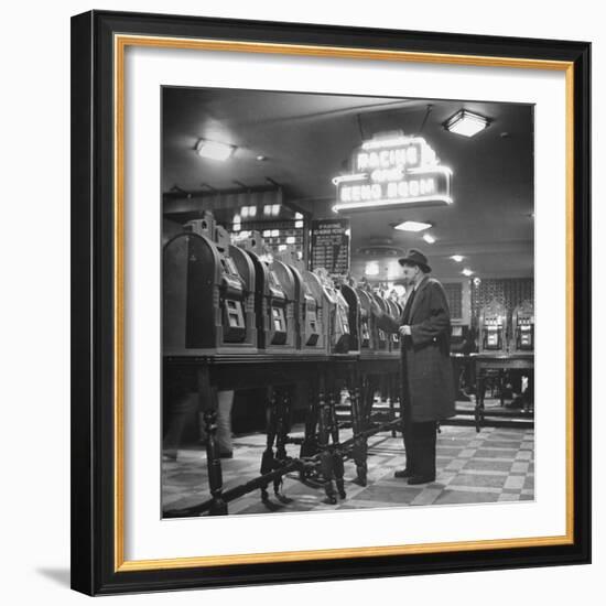 Man Playing the Slot Machines-Ralph Morse-Framed Photographic Print