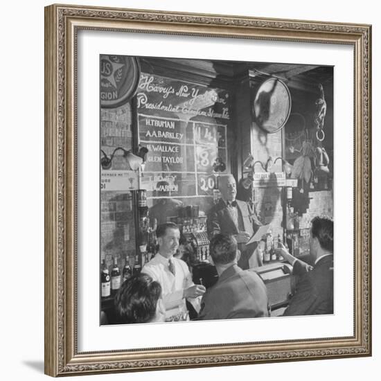 Man Reading About Election Straw Votes at Harry's New York Bar-Yale Joel-Framed Photographic Print