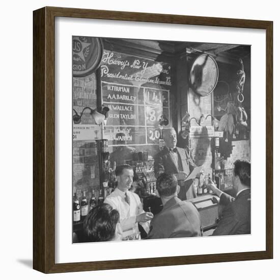 Man Reading About Election Straw Votes at Harry's New York Bar-Yale Joel-Framed Photographic Print