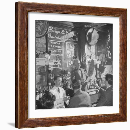 Man Reading About Election Straw Votes at Harry's New York Bar-Yale Joel-Framed Photographic Print