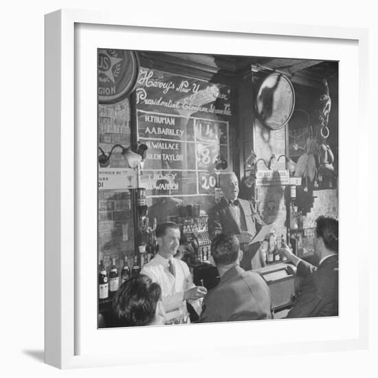 Man Reading About Election Straw Votes at Harry's New York Bar-Yale Joel-Framed Photographic Print