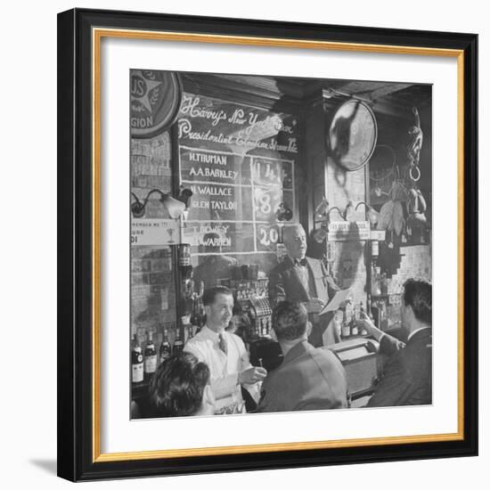 Man Reading About Election Straw Votes at Harry's New York Bar-Yale Joel-Framed Photographic Print